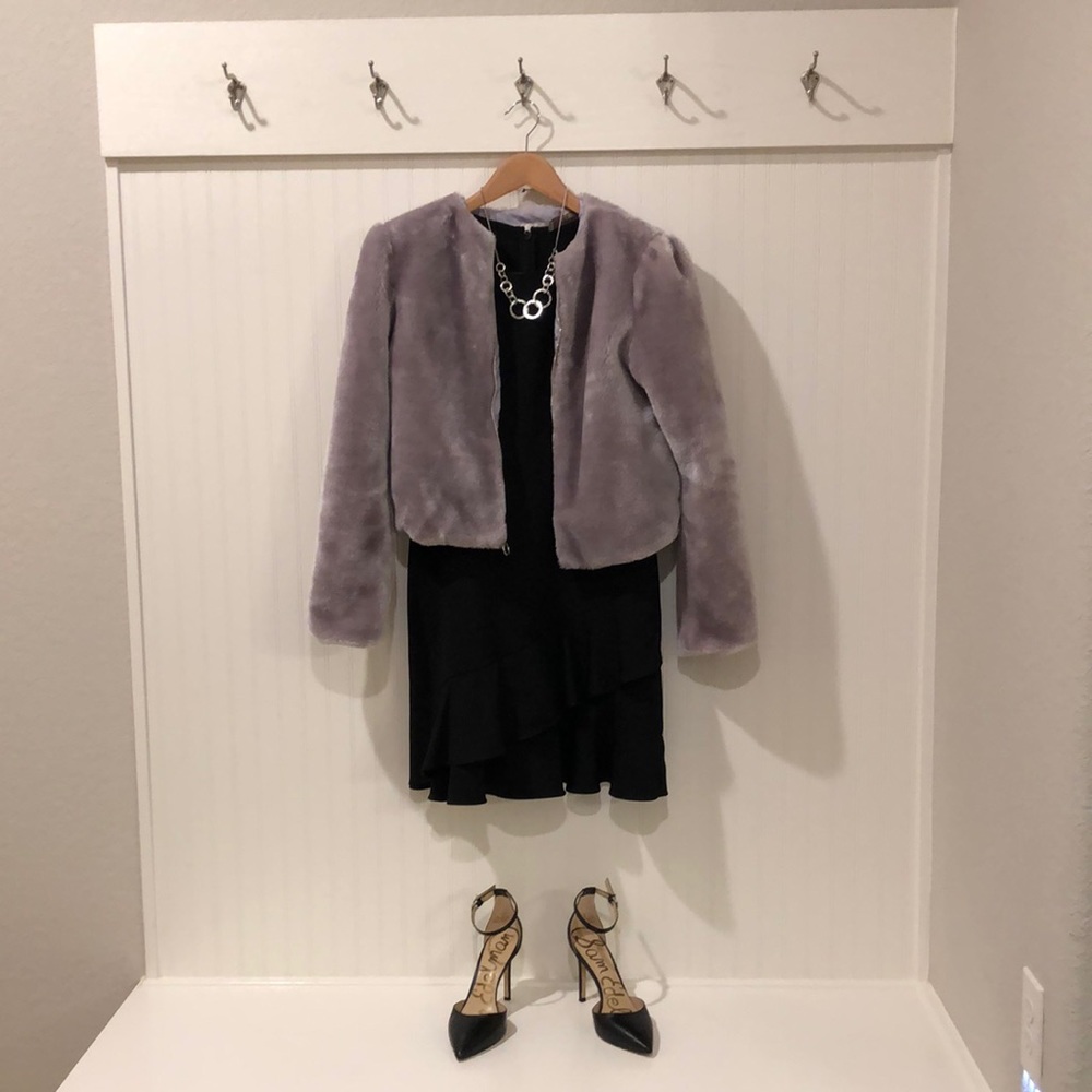 Little black dress # 2, asymmetrical ruffle at bottom, fitted in waist.